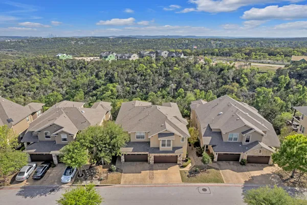 an aerial view of a house with a garden
