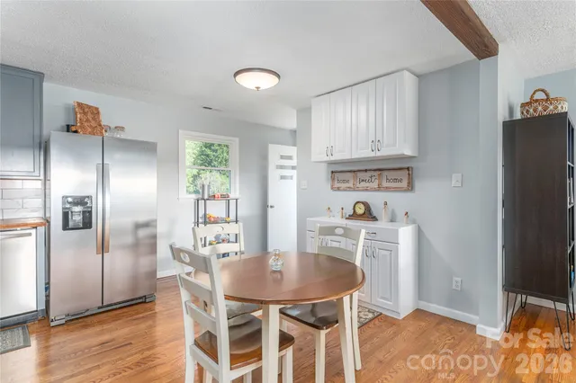a view of a dining room with furniture
