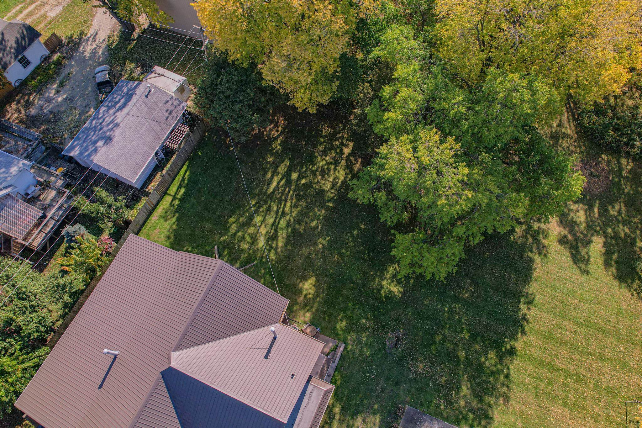 307 West Main Street Monroe Center, IL 61052 - Photo 11 of 31 an aerial view of houses with yard