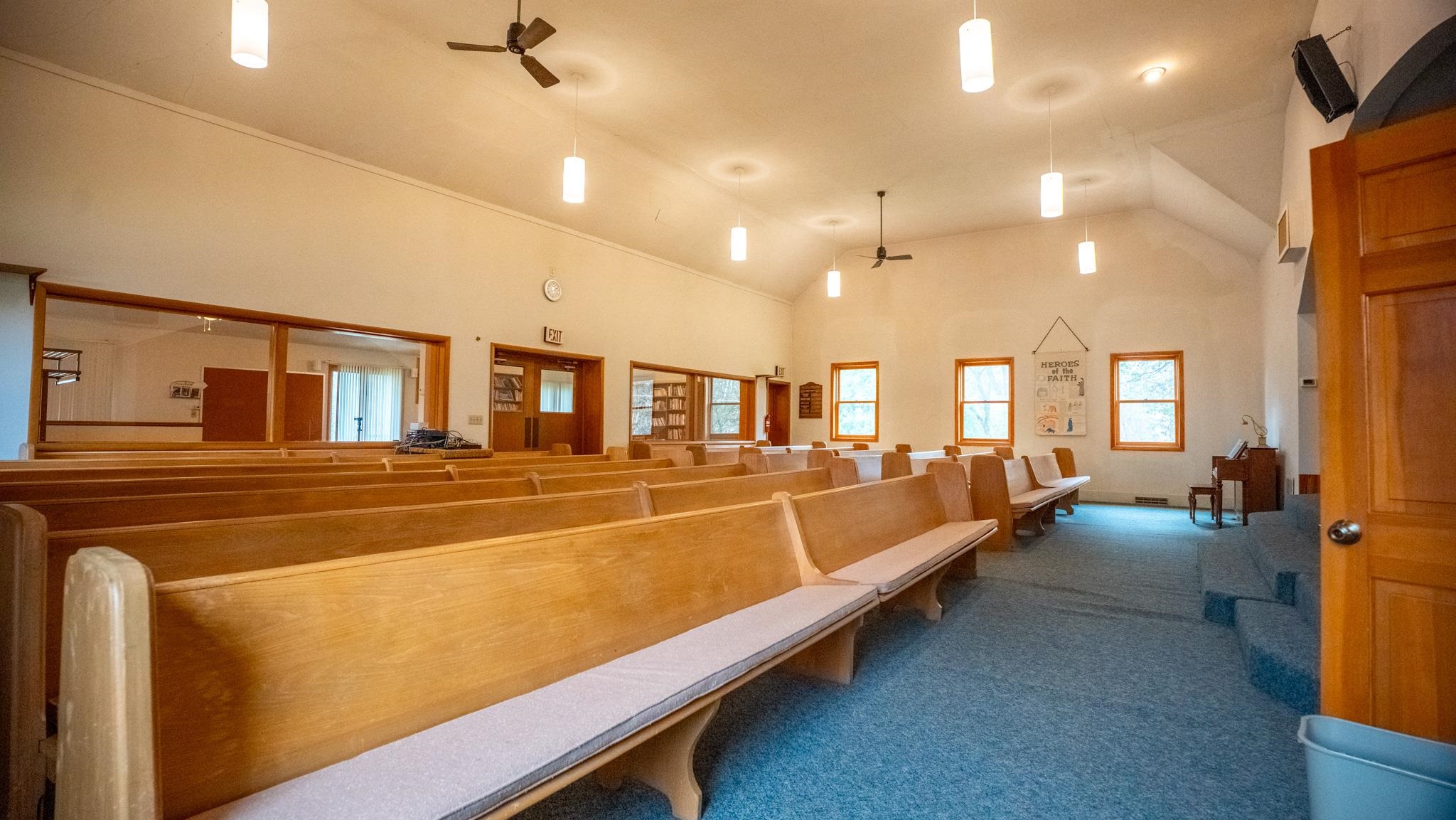 307 West Main Street Monroe Center, IL 61052 - Photo 14 of 31 a living room with furniture and a flat screen tv
