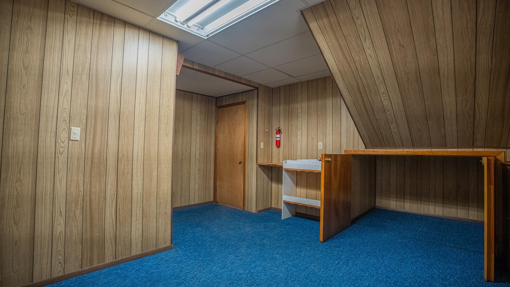 307 West Main Street Monroe Center, IL 61052 - Photo 24 of 31 a view of a room with wooden walls