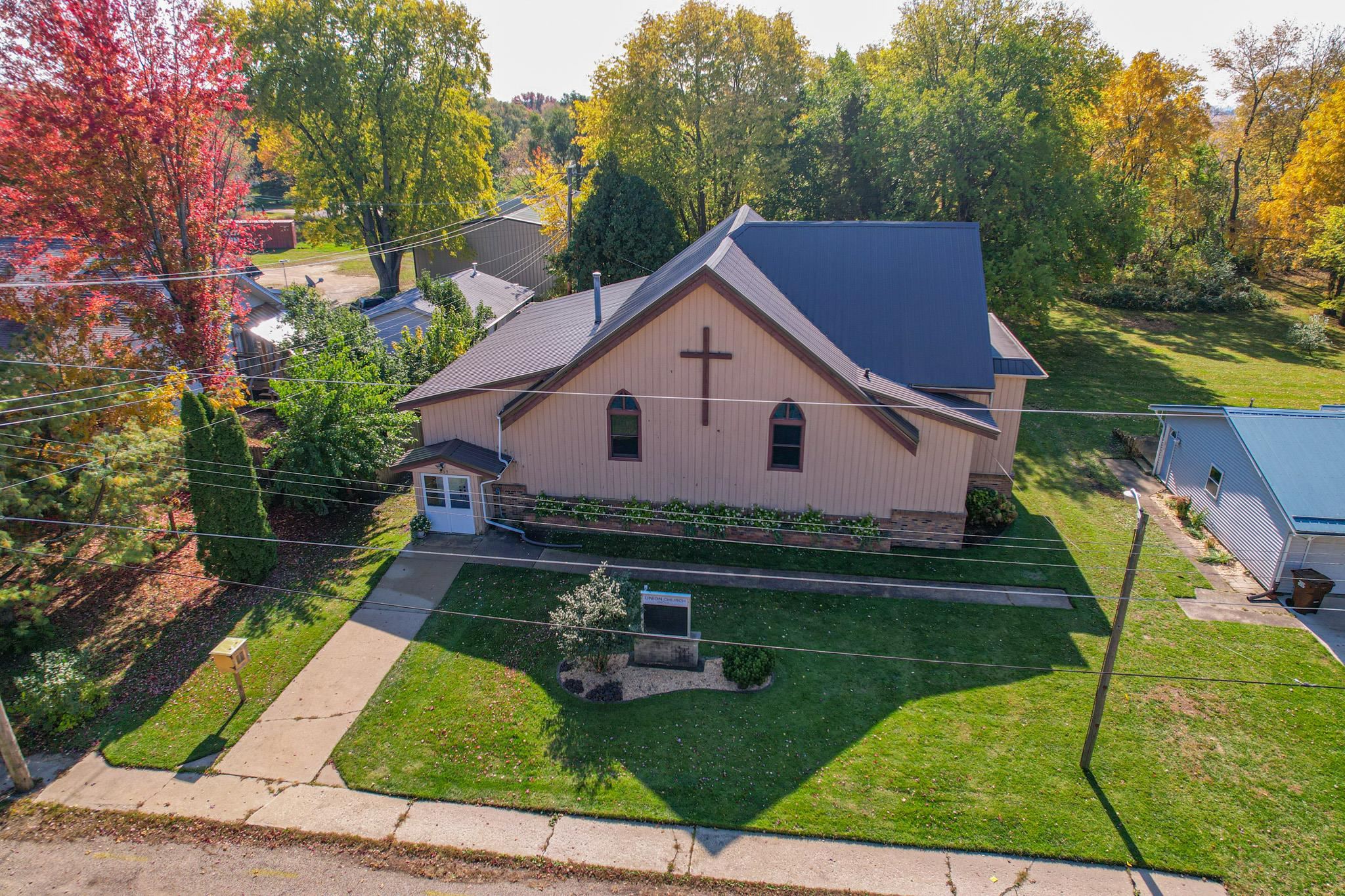 307 West Main Street Monroe Center, IL 61052 - Photo 3 of 31 a view of house with backyard