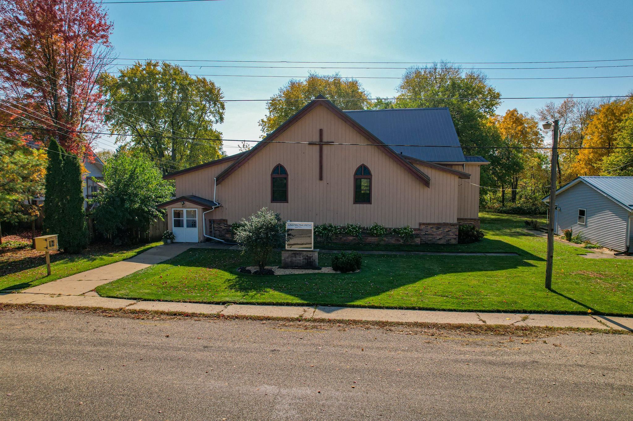 307 West Main Street Monroe Center, IL 61052 - Photo 4 of 31 a view of a yard in front view of a house