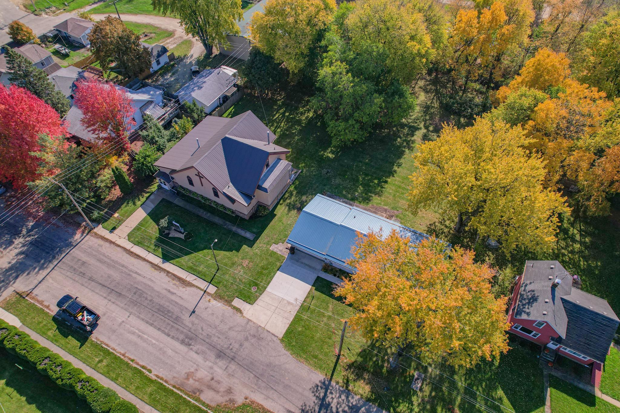 307 West Main Street Monroe Center, IL 61052 - Photo 10 of 31 a view of house with yard