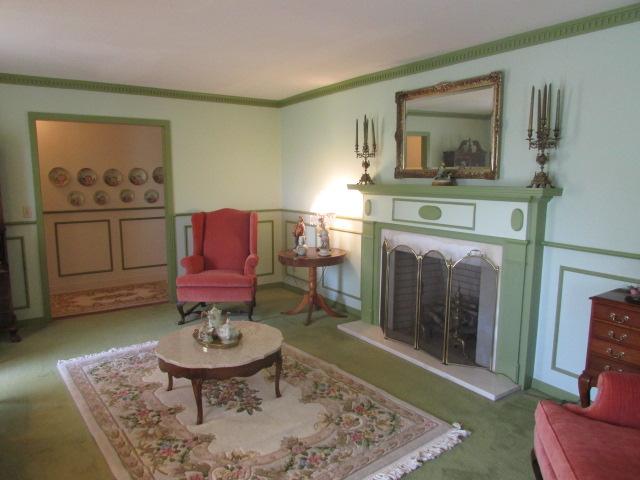 10 Barns Road Leoma, TN 38468 - Photo 2 of 19 a living room with furniture and a fireplace