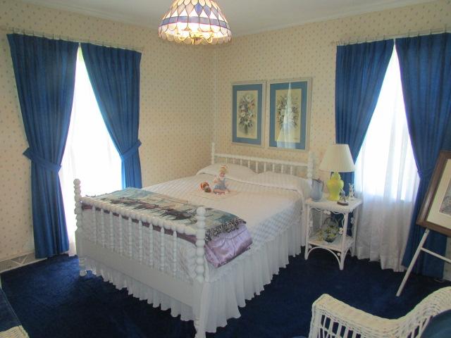 10 Barns Road Leoma, TN 38468 - Photo 11 of 19 a spacious bedroom with a bed and a large window