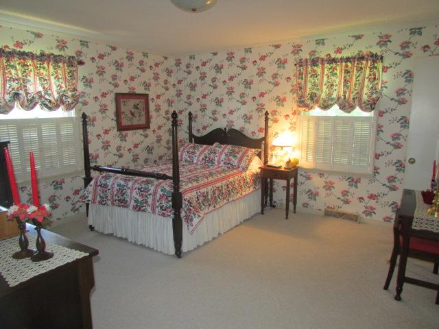 10 Barns Road Leoma, TN 38468 - Photo 12 of 19 a bedroom with a bed and a table in it