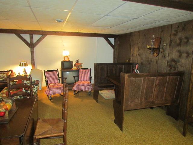 10 Barns Road Leoma, TN 38468 - Photo 15 of 19 a living room with couches and kitchen view with wooden floor