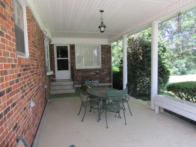 10 Barns Road Leoma, TN 38468 - Photo 18 of 19 a view of a patio with a table and chairs