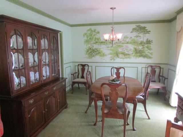 10 Barns Road Leoma, TN 38468 - Photo 8 of 19 a view of a dining room with furniture a chandelier and large windows