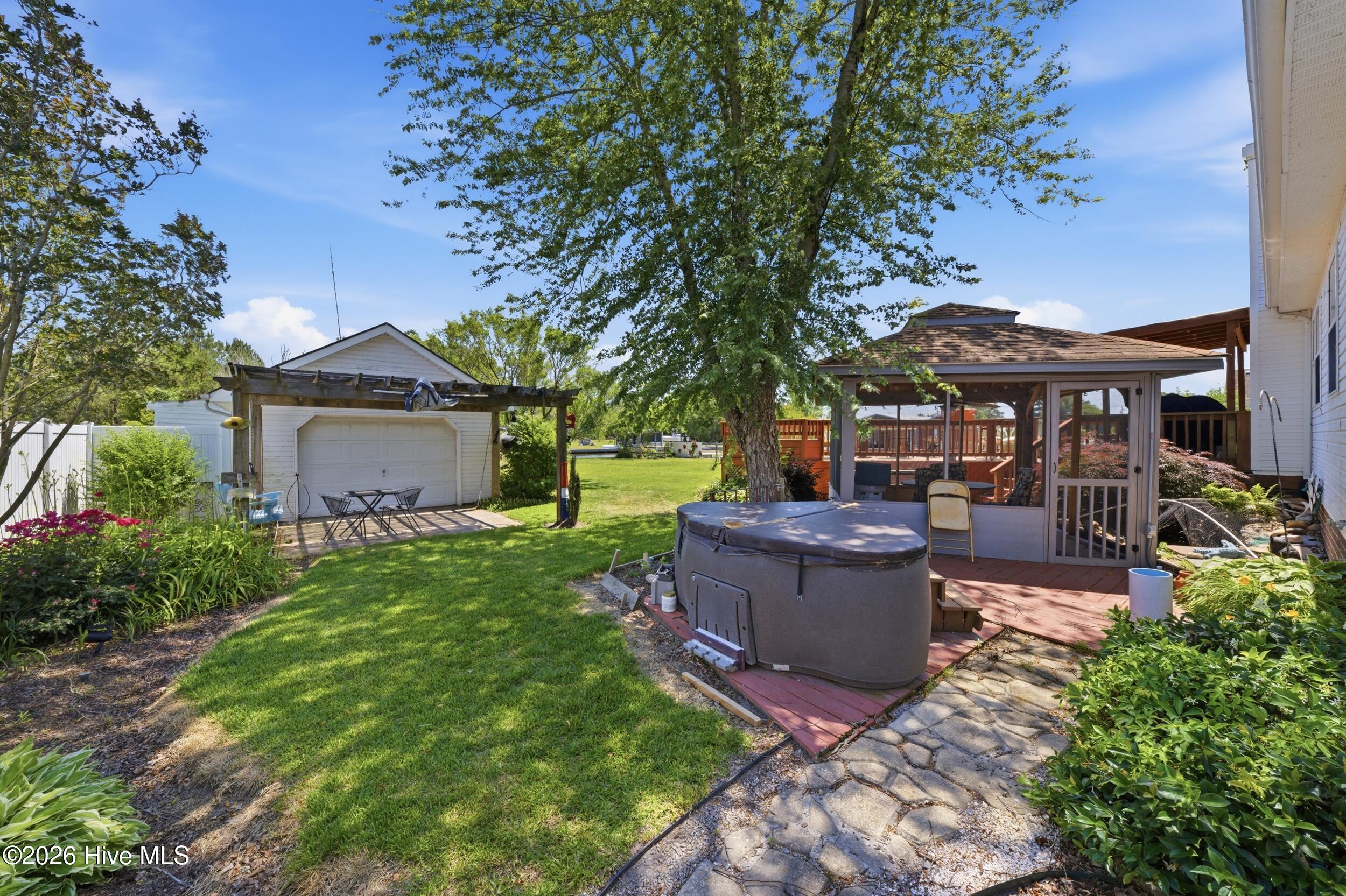136 Simpson Road Barco, NC 27917 - Photo 4 of 54 hot tub and gazebo