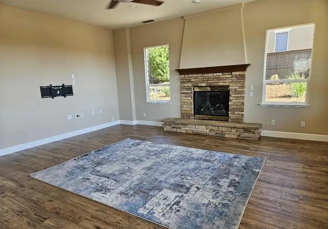 a view of yard with patio