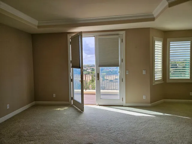 a view of a backyard of the house