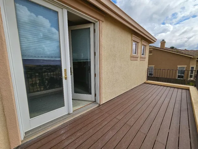 a view of a backyard of the house