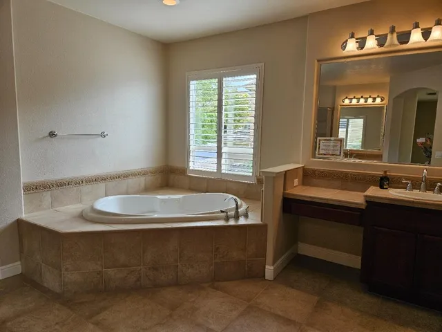 a view of a storage & utility room with racks on the wall