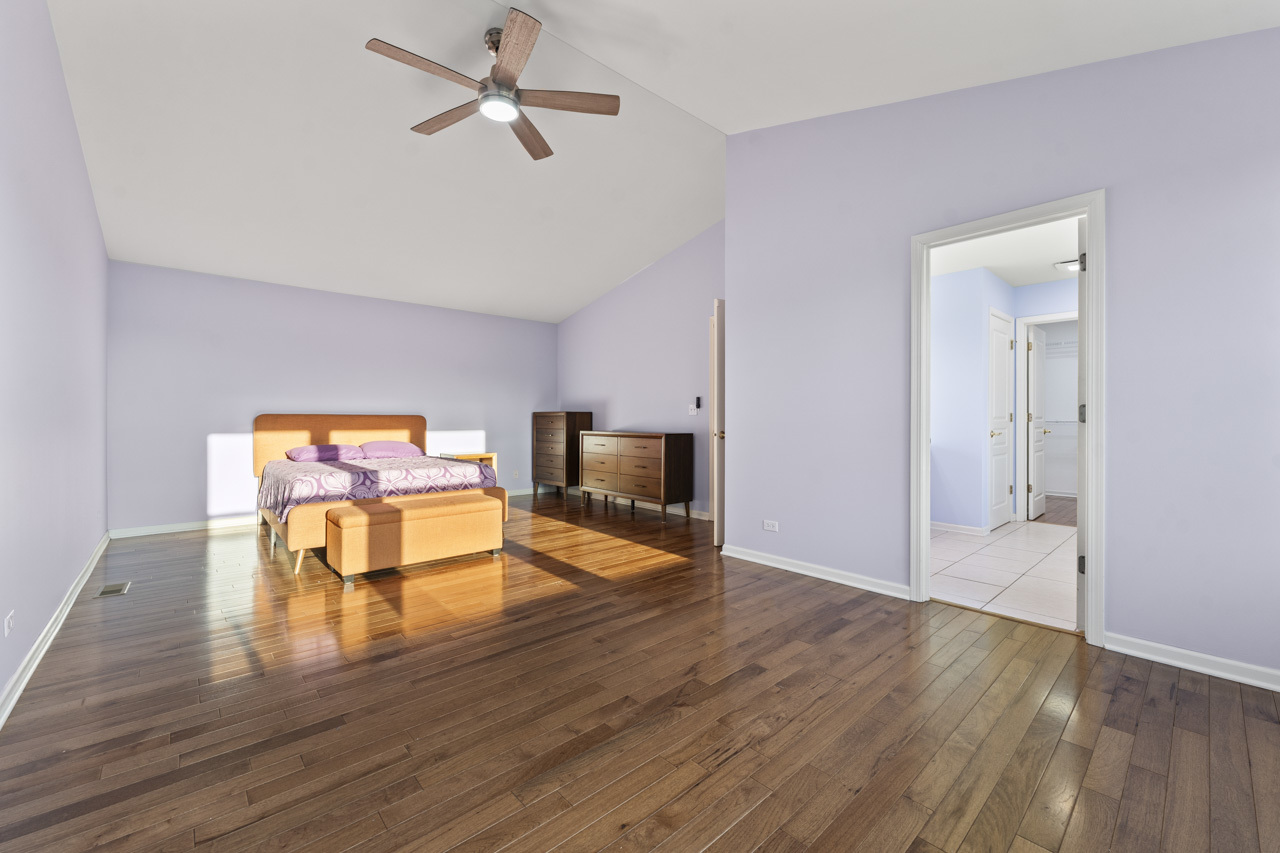 149 Lilac Street Bolingbrook, IL 60490 - Photo 21 of 50 a living room with furniture and a flat screen tv