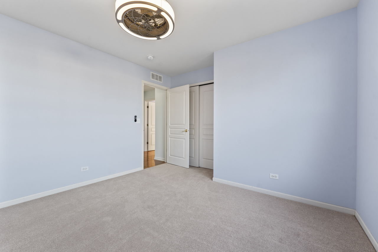 149 Lilac Street Bolingbrook, IL 60490 - Photo 28 of 50 a view of a room with a fan