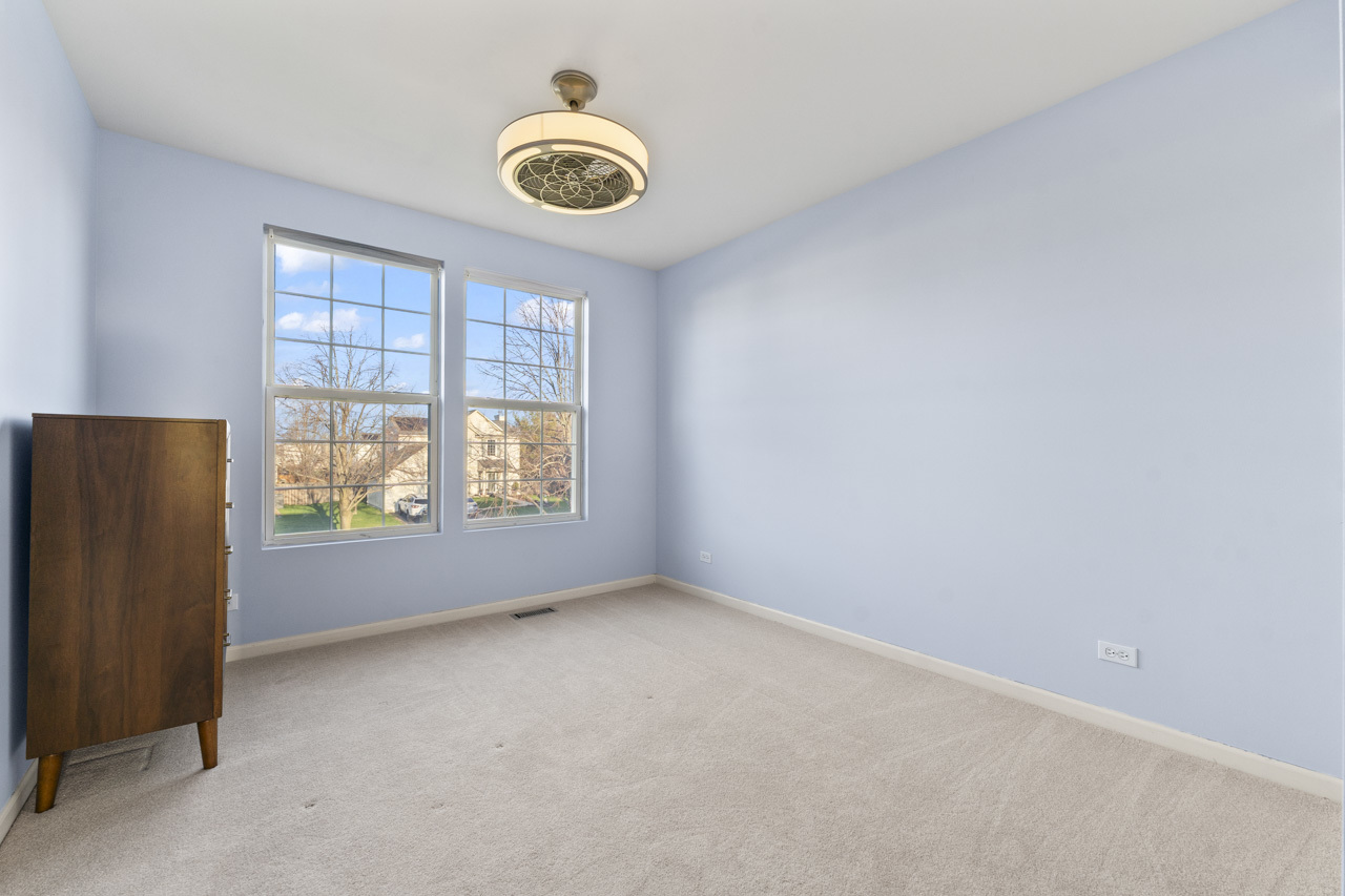 149 Lilac Street Bolingbrook, IL 60490 - Photo 31 of 50 an empty room with a window