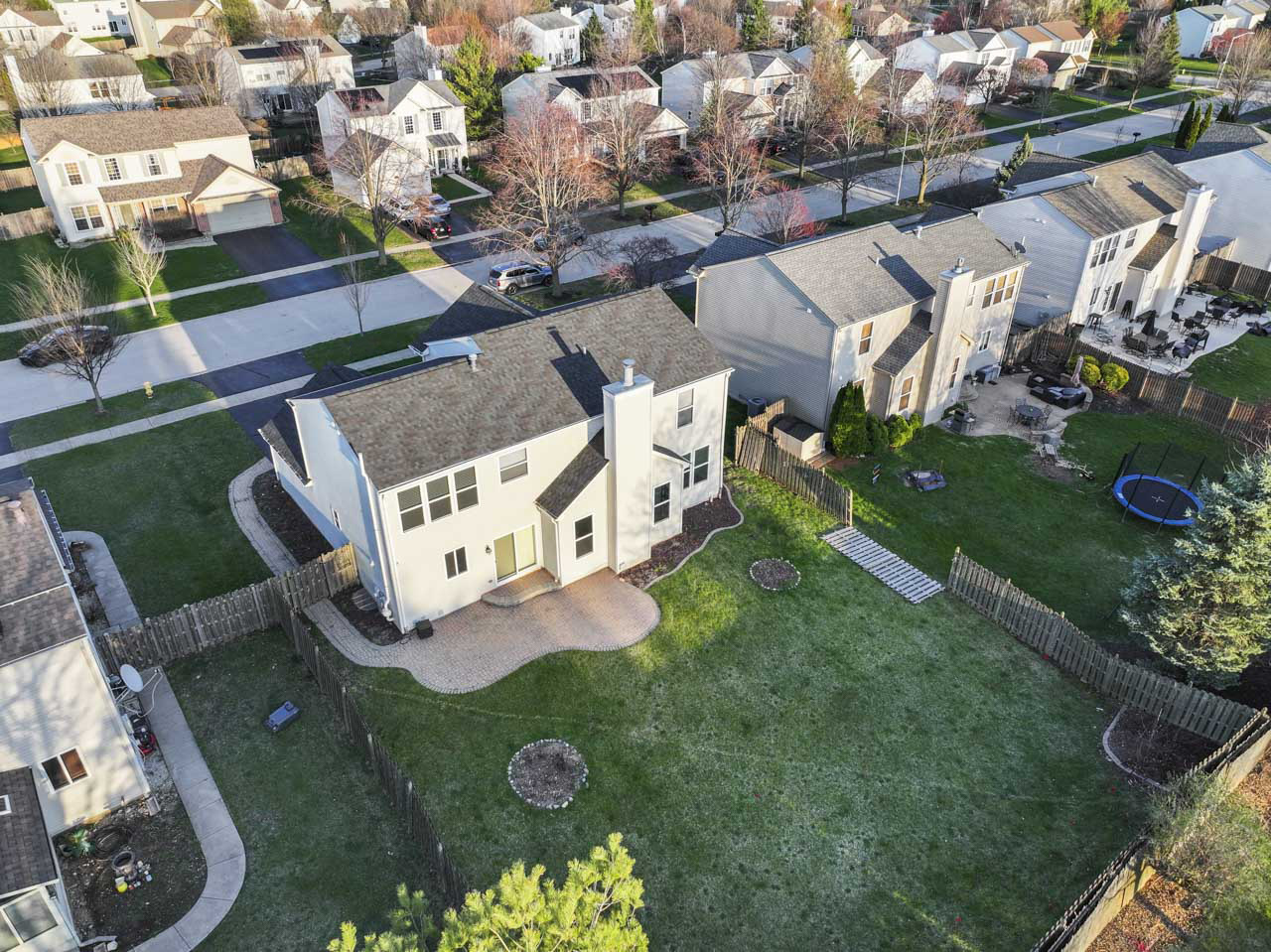 149 Lilac Street Bolingbrook, IL 60490 - Photo 45 of 50 an aerial view of a house with a yard