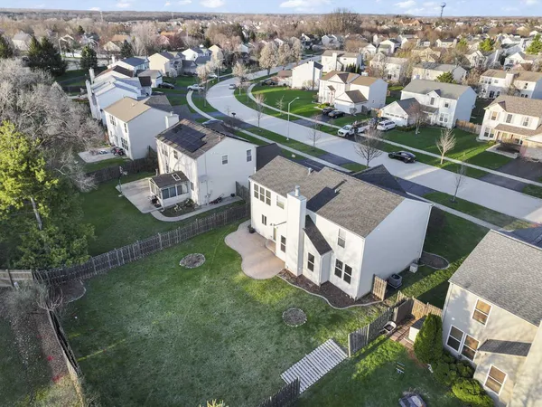 an aerial view of a house having yard
