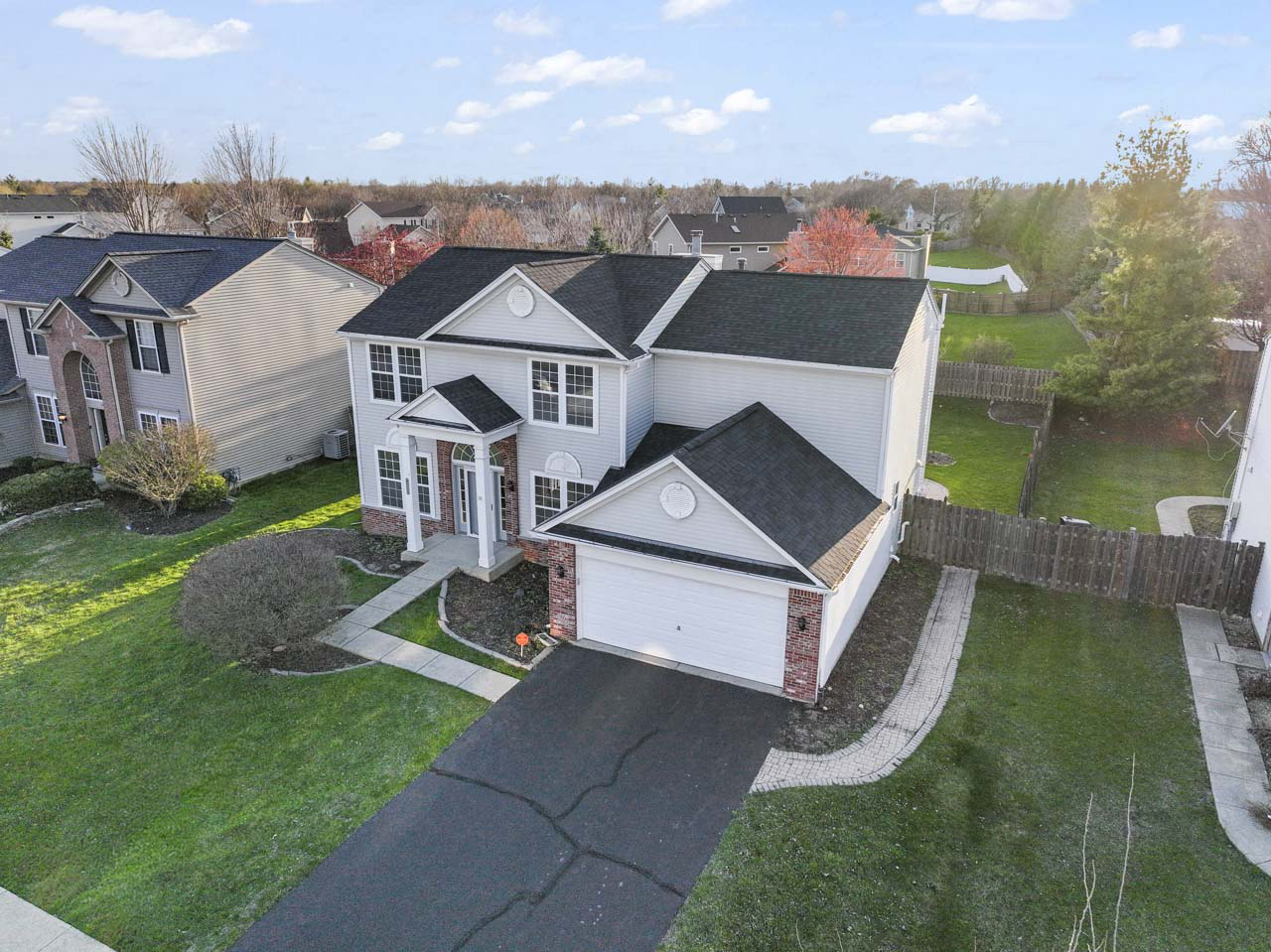 149 Lilac Street Bolingbrook, IL 60490 - Photo 47 of 50 an aerial view of a house having yard