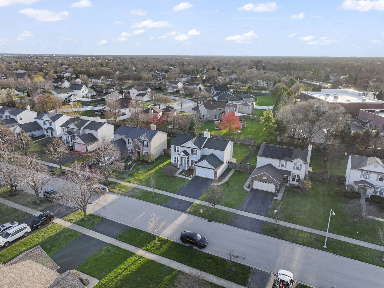 149 Lilac Street Bolingbrook, IL 60490 - Photo 49 of 50 an aerial view of residential houses with outdoor space and parking