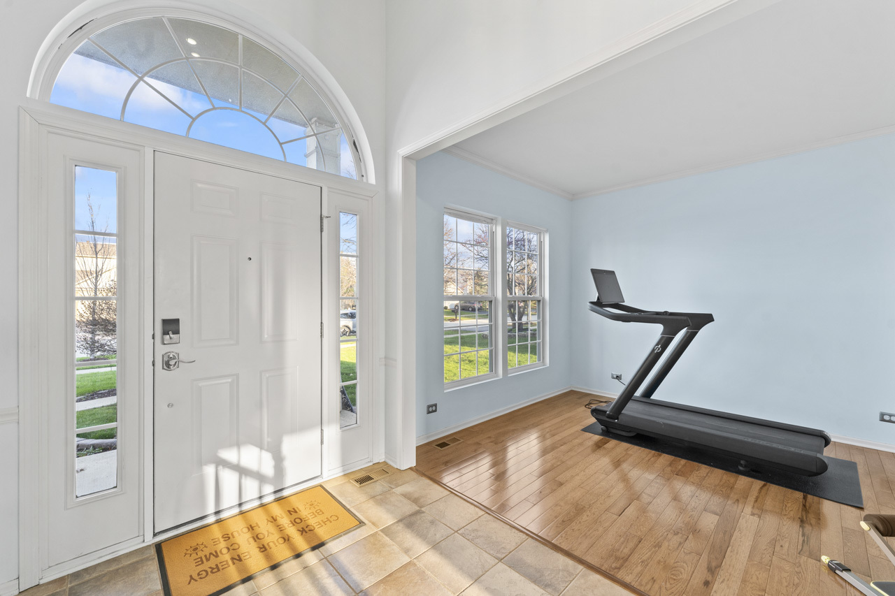 149 Lilac Street Bolingbrook, IL 60490 - Photo 6 of 50 wooden floor in an empty room with a window