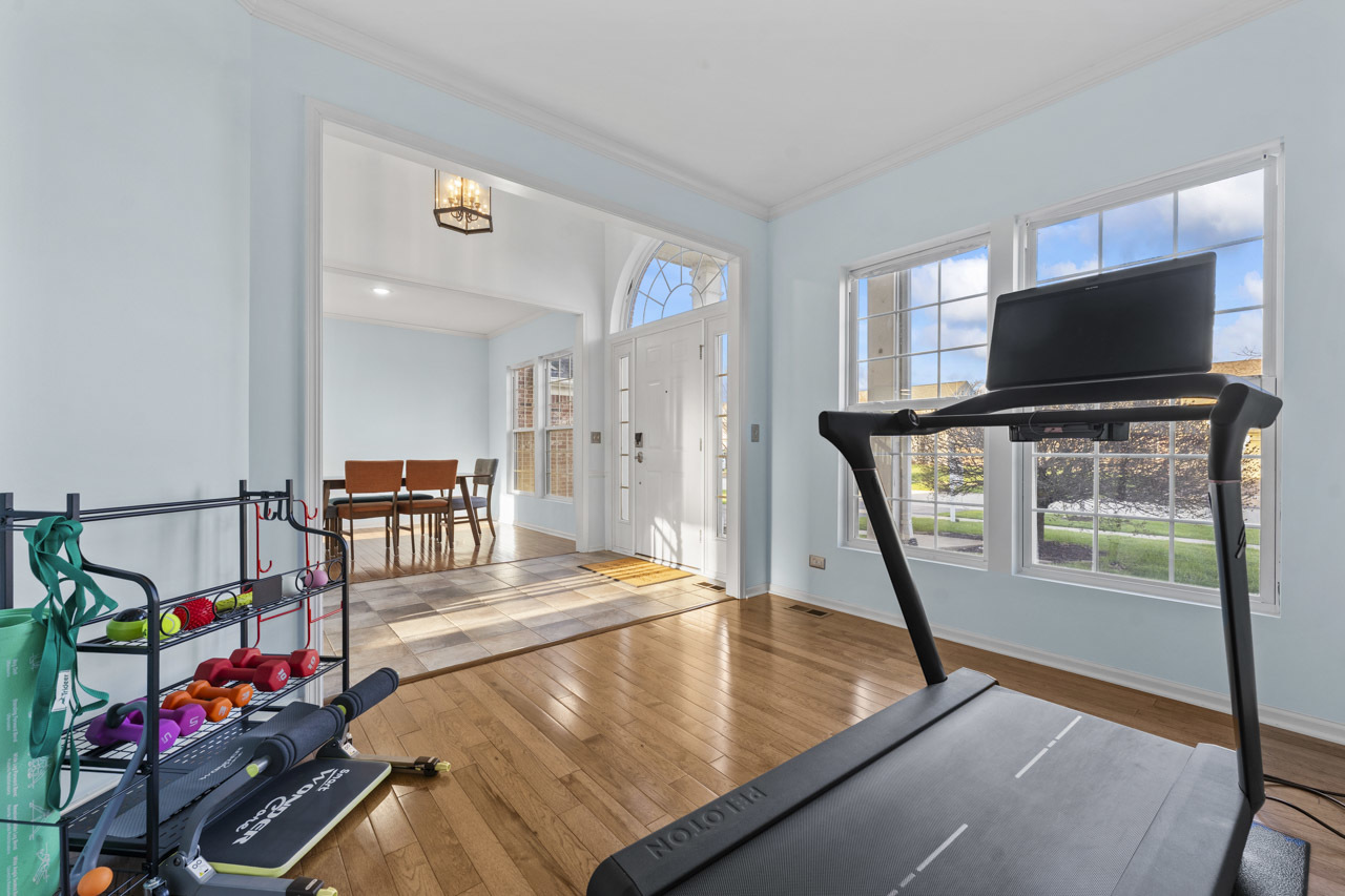 149 Lilac Street Bolingbrook, IL 60490 - Photo 7 of 50 a living room with furniture and a flat screen tv
