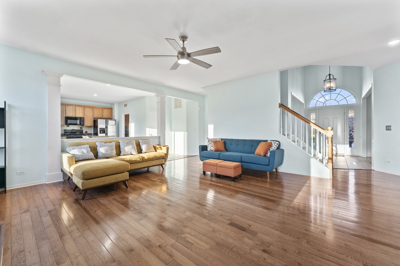 149 Lilac Street Bolingbrook, IL 60490 - Photo 10 of 50 a living room with furniture and wooden floor