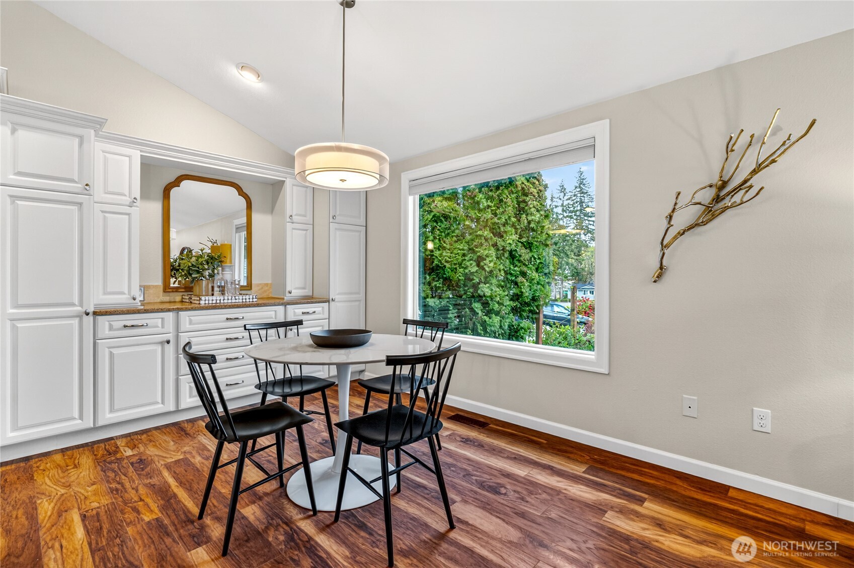 13236 Southeast 161st Place Renton, WA 98058 - Photo 19 of 38 a view of a dining room with furniture window and outside view