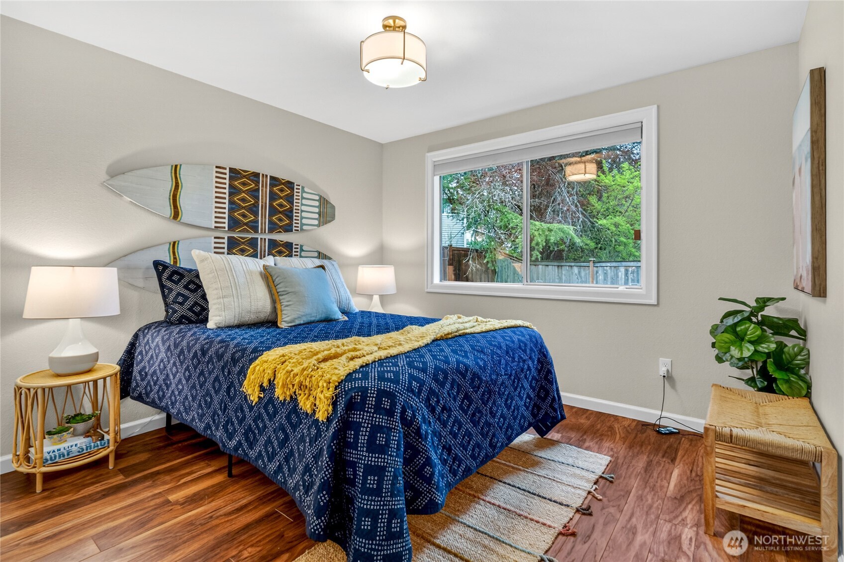 13236 Southeast 161st Place Renton, WA 98058 - Photo 23 of 38 a bedroom with bed and wooden floor