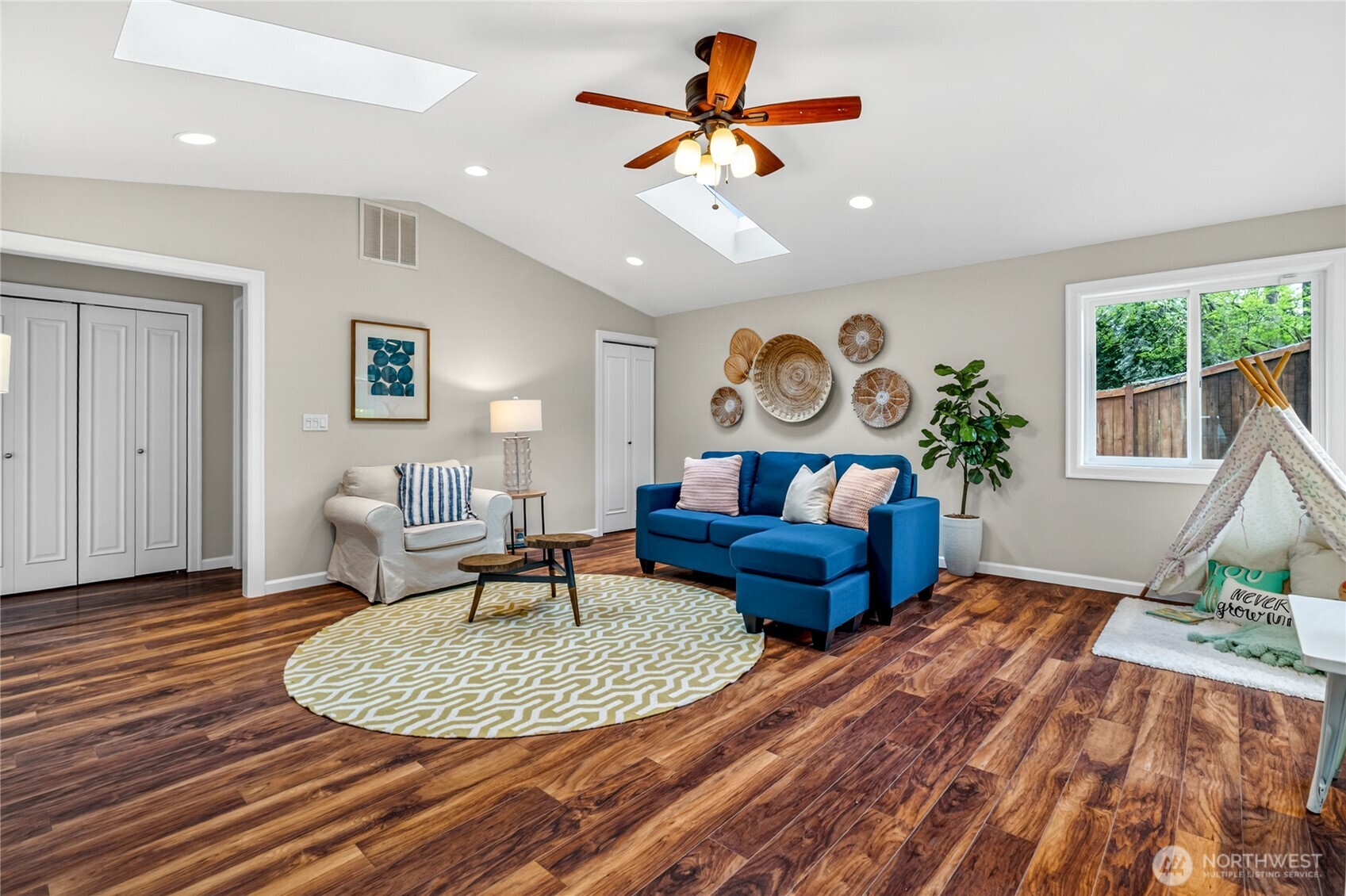 13236 Southeast 161st Place Renton, WA 98058 - Photo 28 of 38 a living room with furniture and a wooden floor