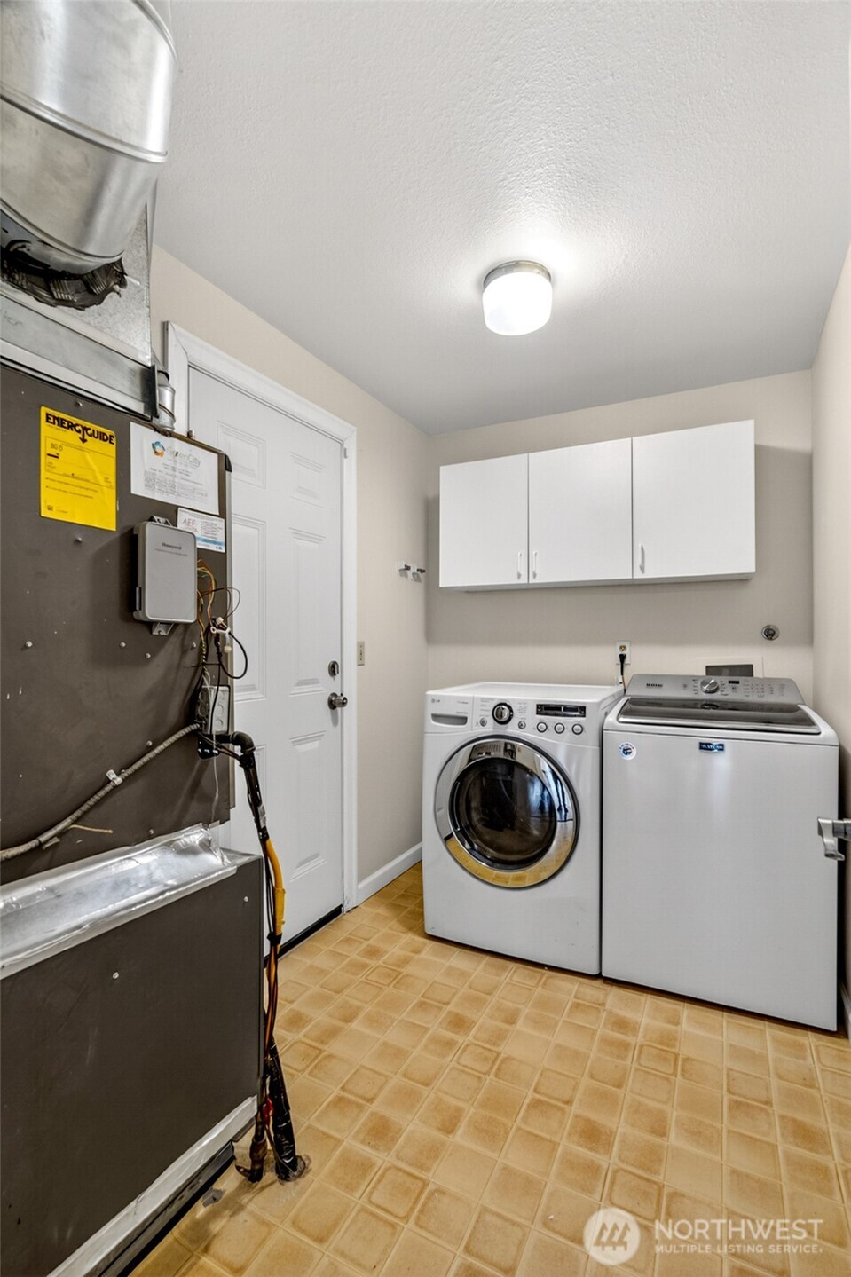 13236 Southeast 161st Place Renton, WA 98058 - Photo 29 of 38 a utility room with sink dryer and washer