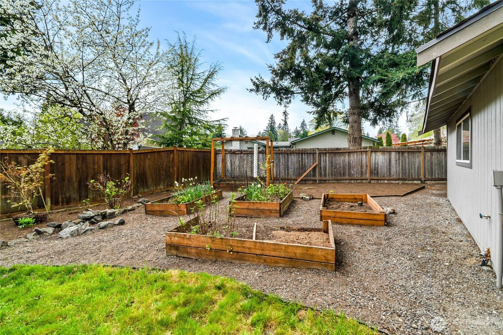 13236 Southeast 161st Place Renton, WA 98058 - Photo 32 of 38 a view of a bench in backyard of house