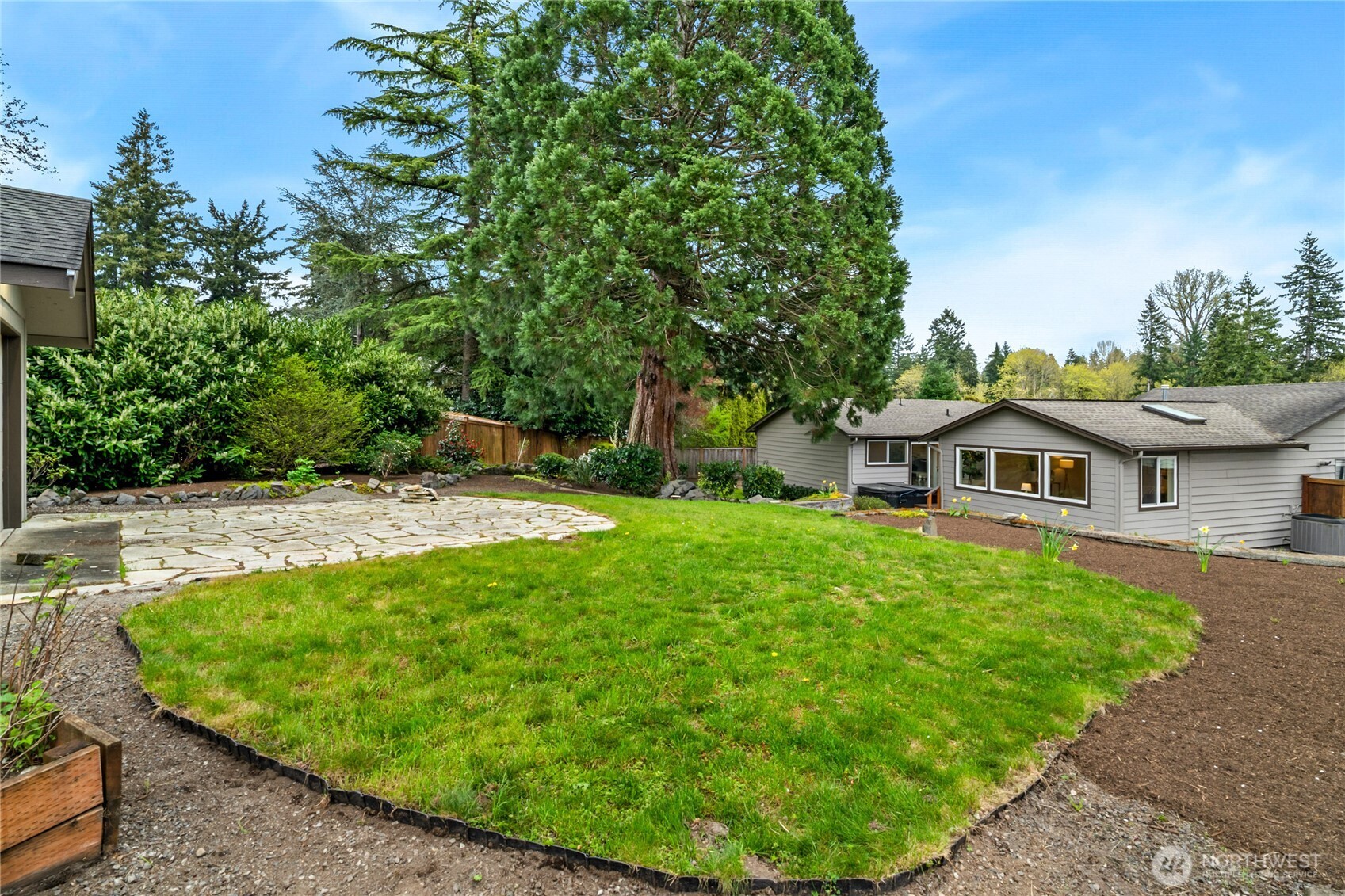 13236 Southeast 161st Place Renton, WA 98058 - Photo 33 of 38 a view of a house with a backyard