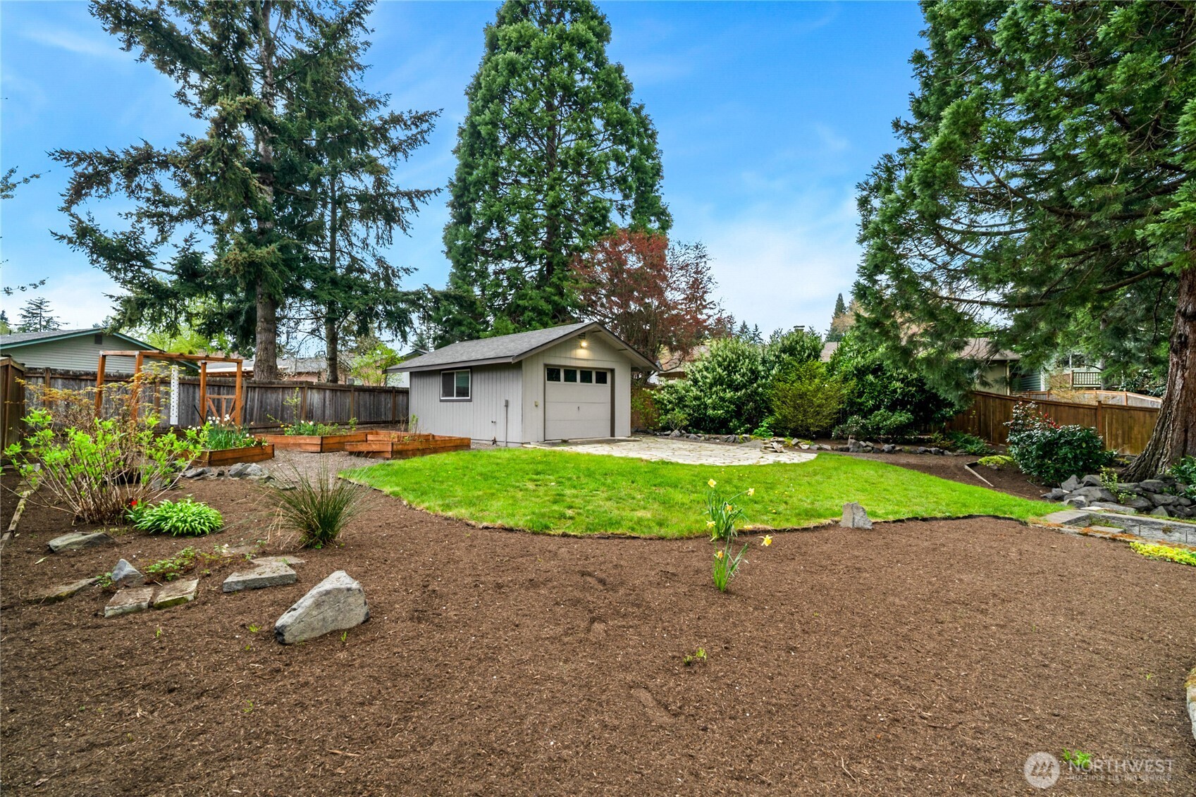 13236 Southeast 161st Place Renton, WA 98058 - Photo 34 of 38 a view of a house with backyard and garden