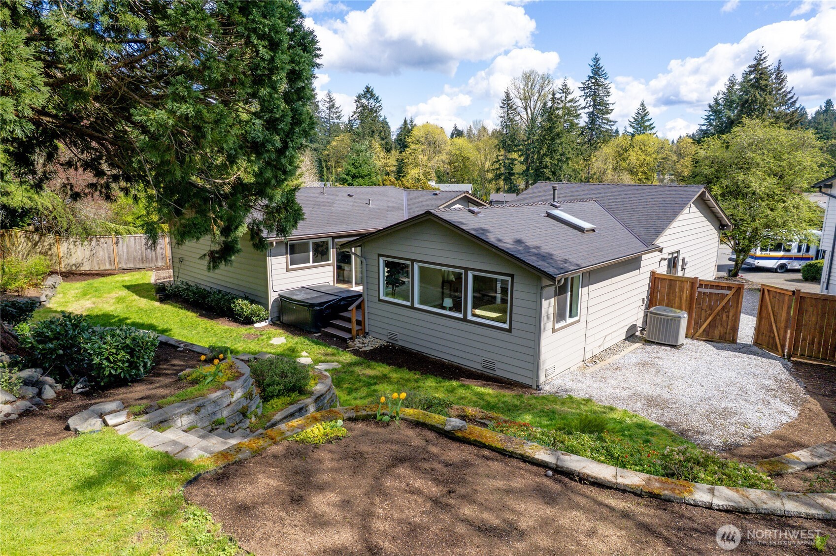 13236 Southeast 161st Place Renton, WA 98058 - Photo 35 of 38 a aerial view of a house with a yard table and chairs