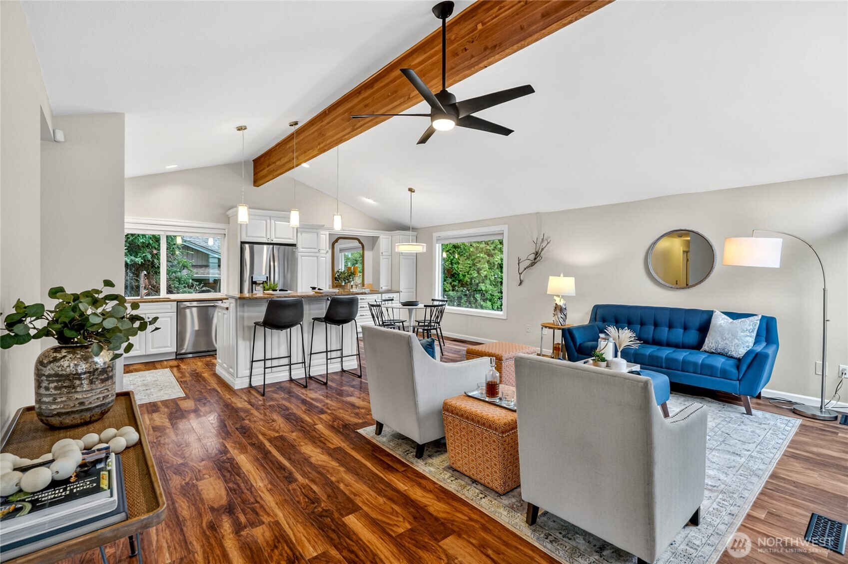 13236 Southeast 161st Place Renton, WA 98058 - Photo 6 of 38 a living room with furniture kitchen view and a large window