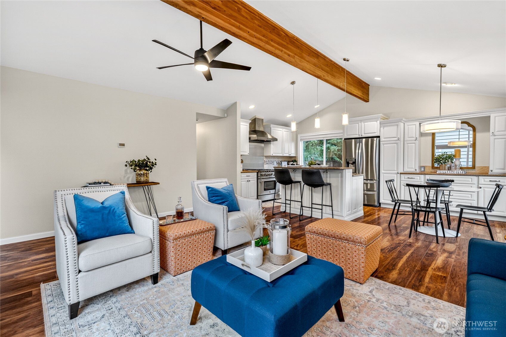 13236 Southeast 161st Place Renton, WA 98058 - Photo 7 of 38 a living room with furniture kitchen view and a chandelier