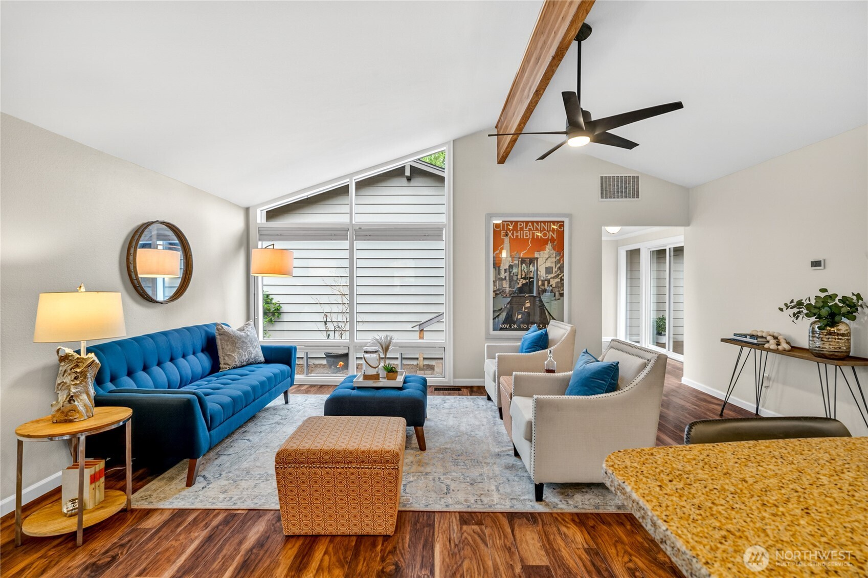 13236 Southeast 161st Place Renton, WA 98058 - Photo 8 of 38 a living room with furniture and a large window