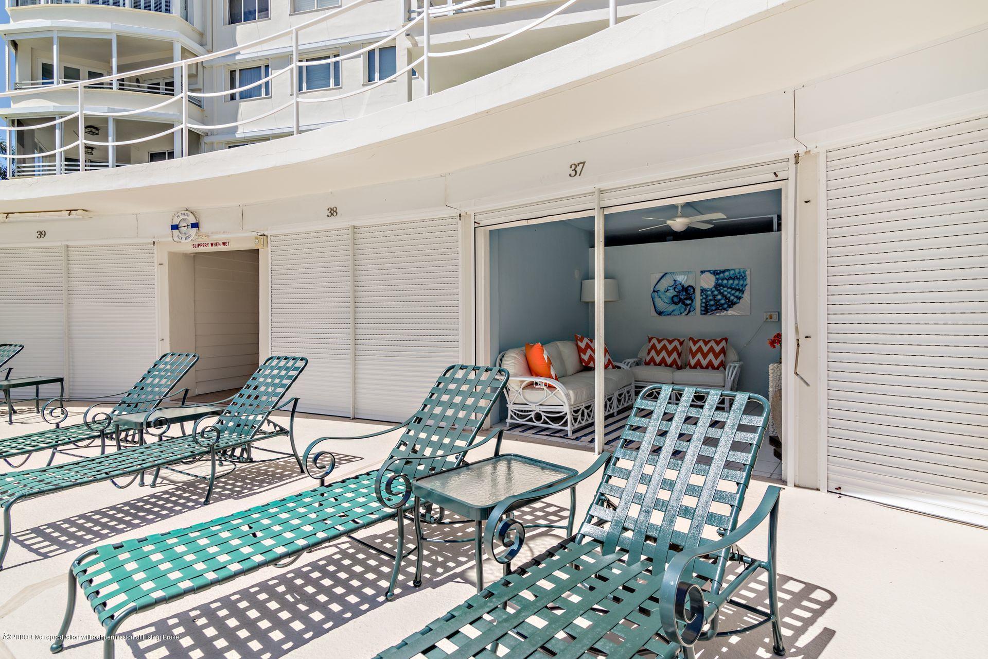 44 Cocoanut Row, Unit 326B Palm Beach, FL 33480 - Photo 12 of 19 a balcony with table and chairs