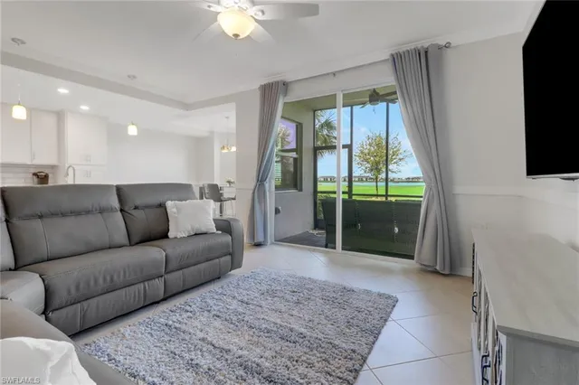 a living room with a couch and a flat screen tv