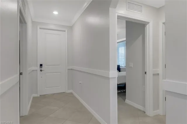 wooden floor in a hall with an entryway