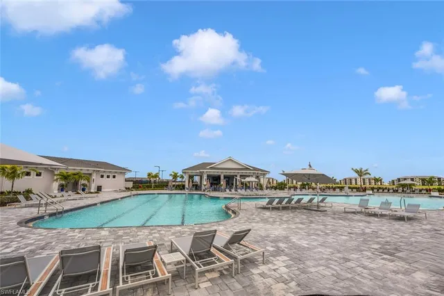 a view of a chairs and table in patio
