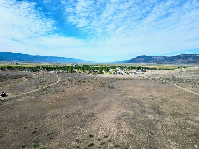 600 East E Street Moroni, UT 84646 - Photo 11 of 38 Expansive undeveloped terrain with distant residential structures and mountain ranges