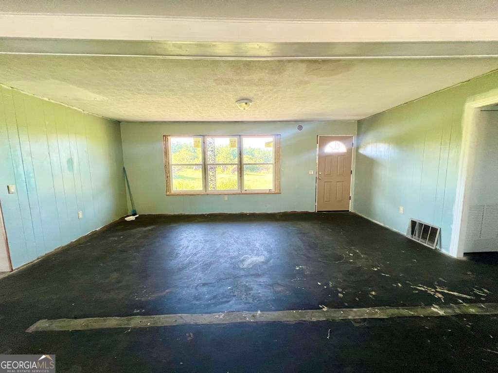 82 Cook Road Hazlehurst, GA 31539 - Photo 30 of 57 a view of an empty room with a window