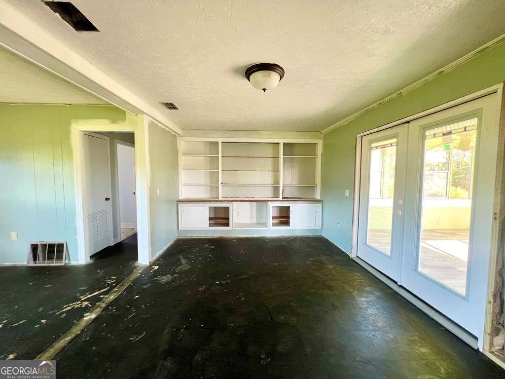 82 Cook Road Hazlehurst, GA 31539 - Photo 31 of 57 a view of an empty room with a window