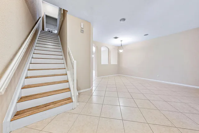 a view of an entryway with staircase