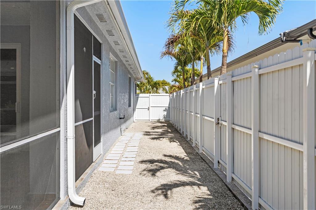 183 7th Street Naples, FL 34113 - Photo 42 of 50 Side view of property exterior