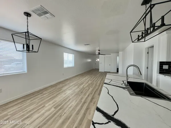 a view of a workspace with furniture